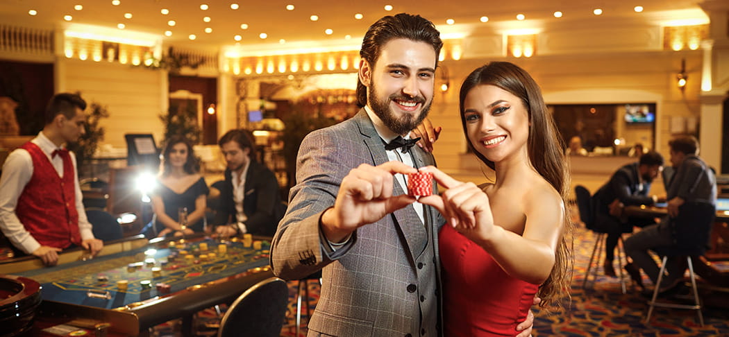 A man and woman in a casino.