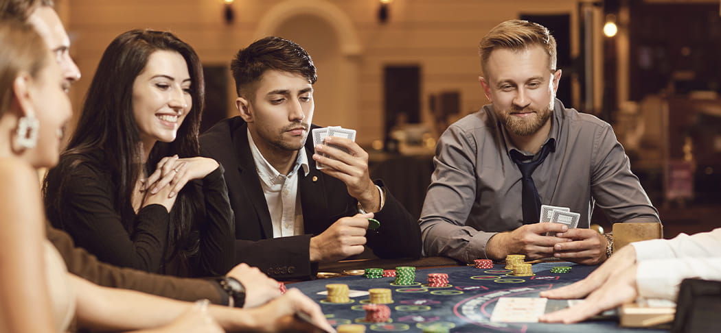 People playing blackjack.