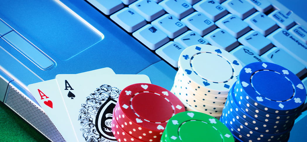 Poker cards on a laptop.